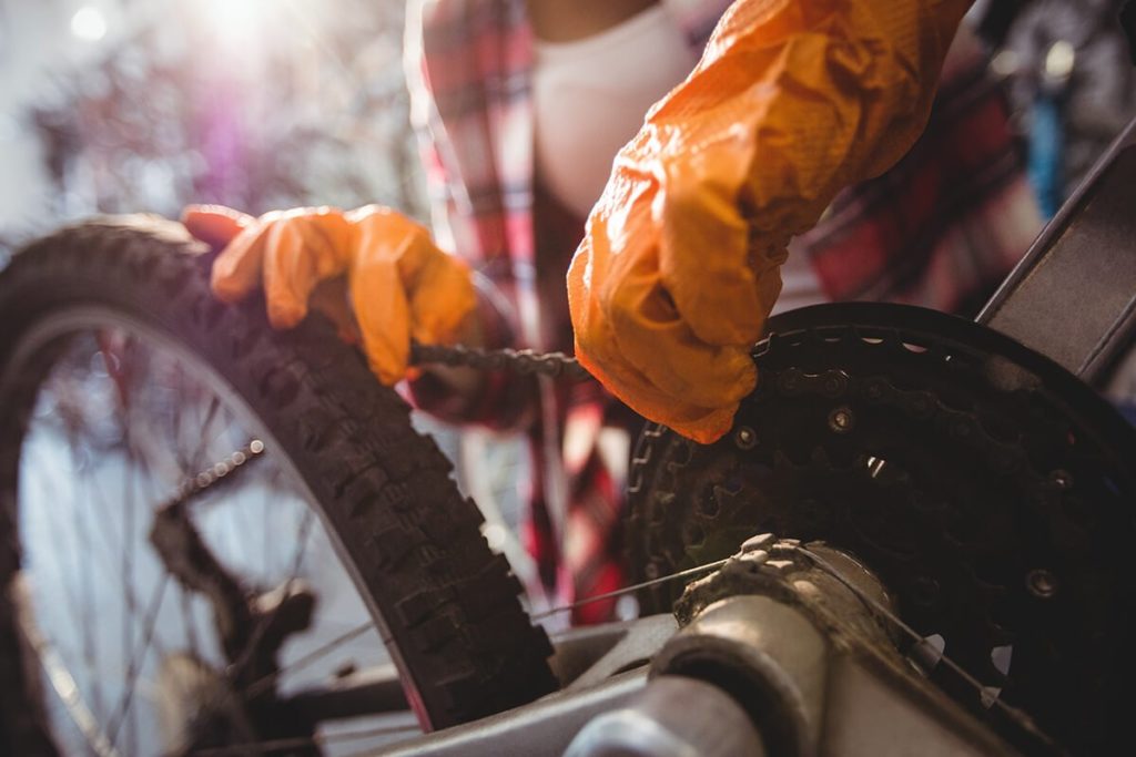 moving the bike chain to the biggest gear