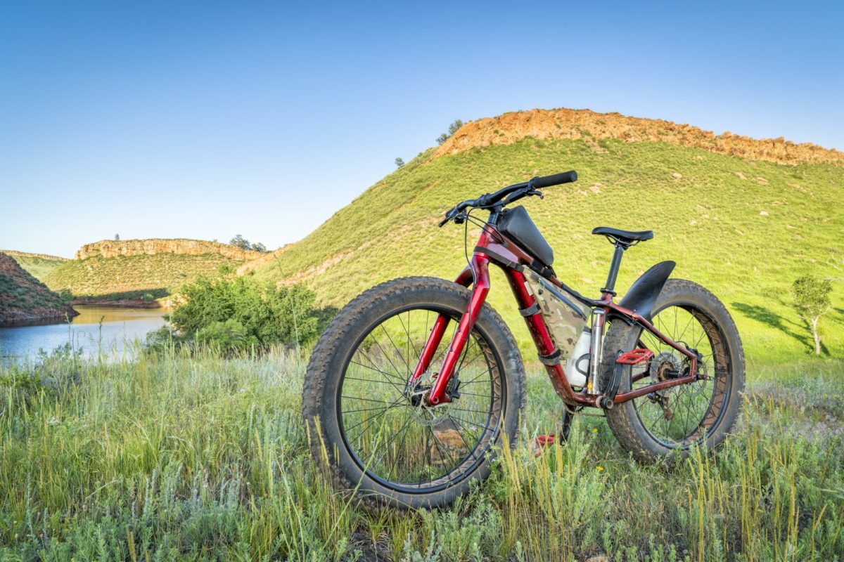 fat tire bike at lake with fender on back tire