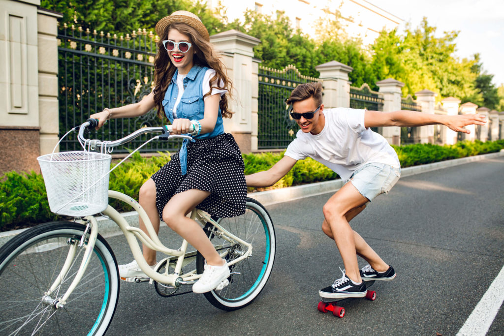 couple on retro style bike
