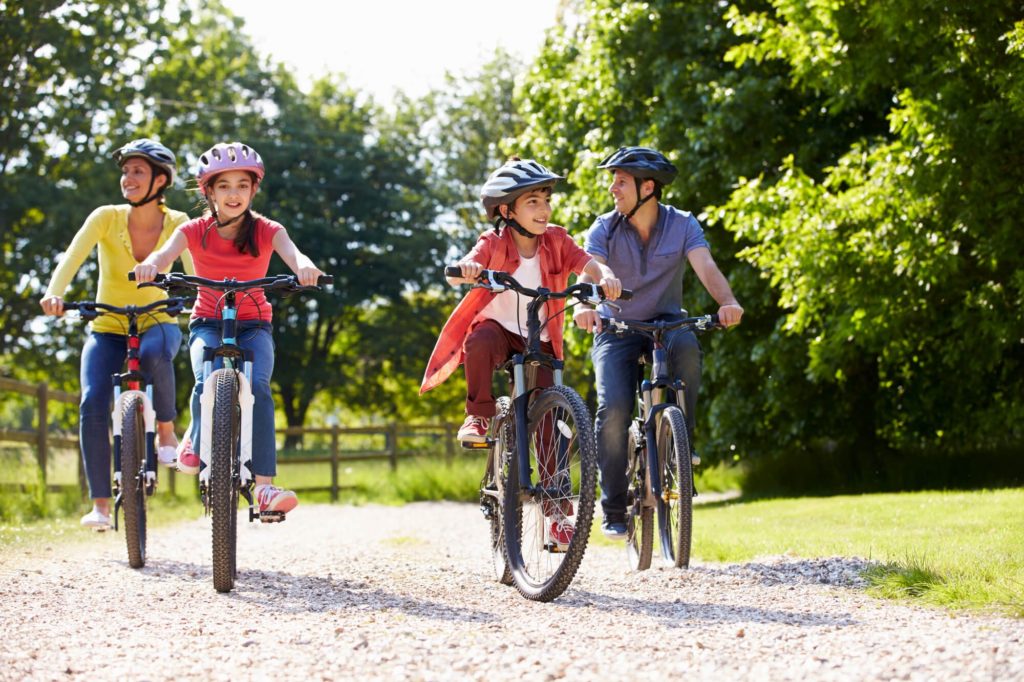 family riding bikes