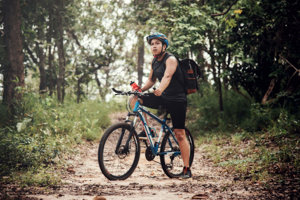 mountain biker in forest