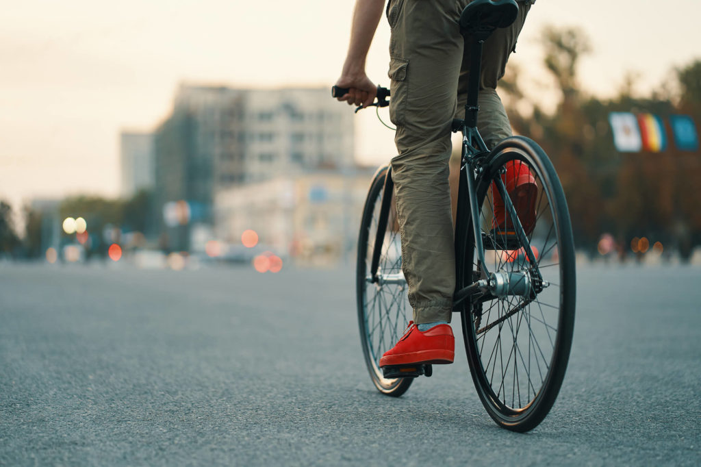 man biking in the city