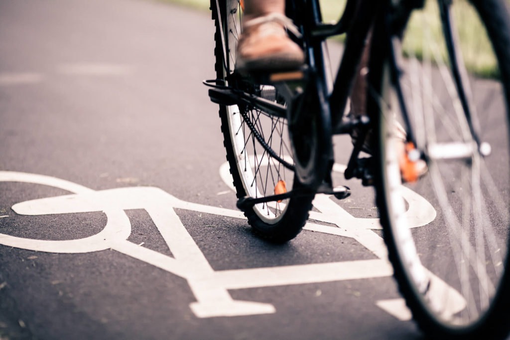 man breaking on bike