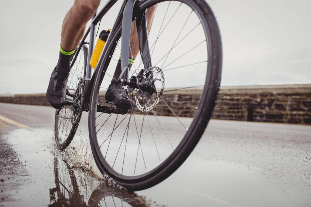 riding bicycle in rain